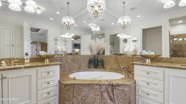 full bath featuring visible vents, vanity, a garden tub, and crown molding