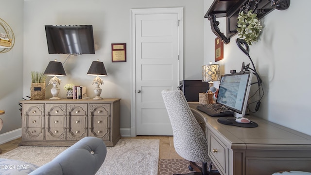 home office featuring baseboards