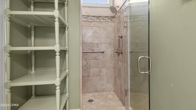 bathroom with a shower stall