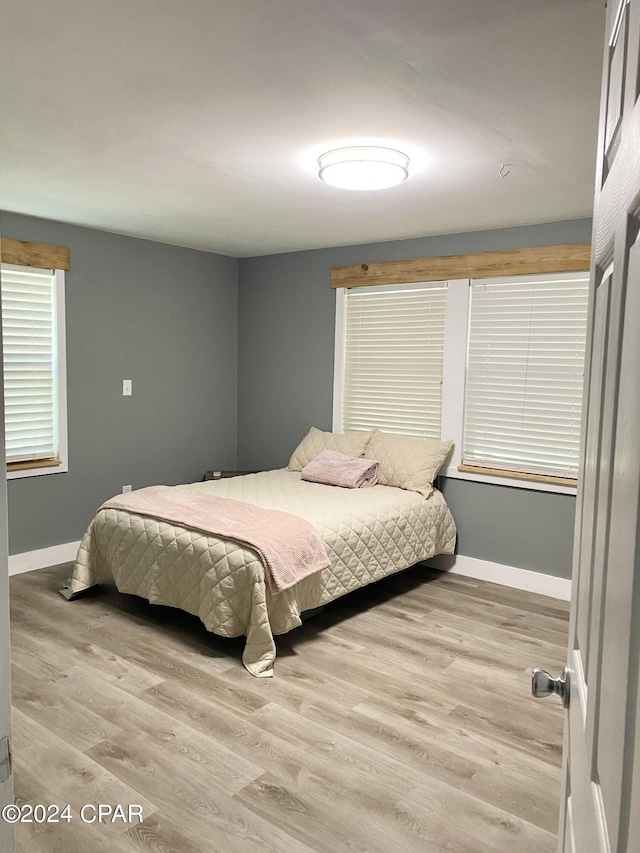 bedroom featuring light hardwood / wood-style flooring