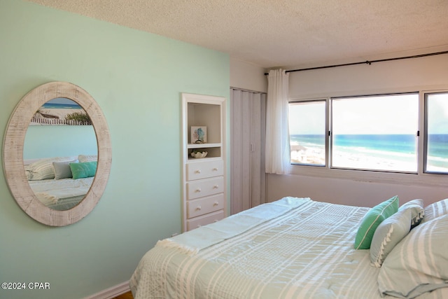 bedroom featuring a textured ceiling