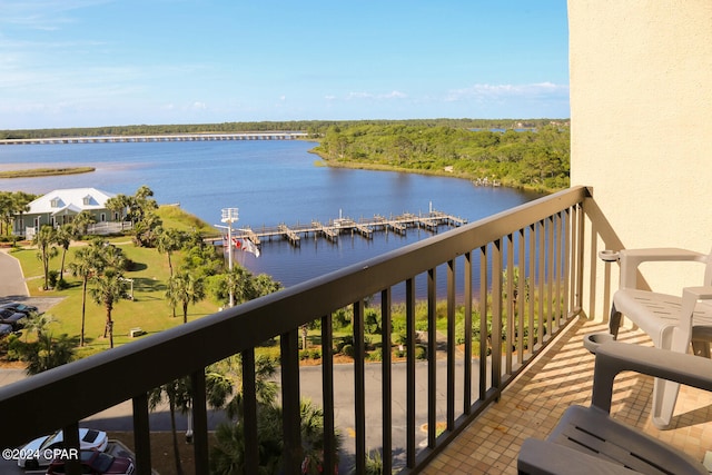 balcony featuring a water view