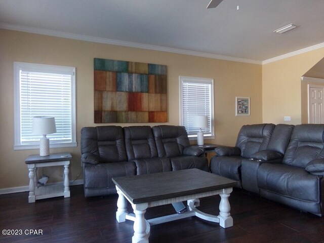 living room with crown molding, ceiling fan, and dark hardwood / wood-style flooring