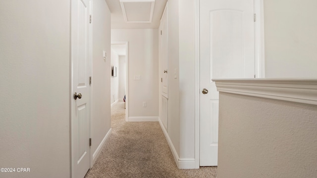 corridor with light carpet