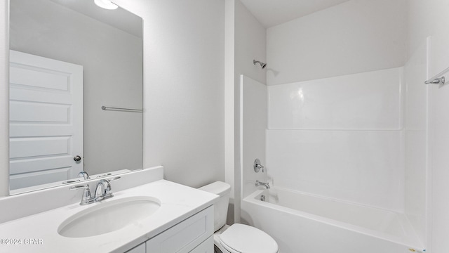 full bathroom featuring vanity, toilet, and bathtub / shower combination