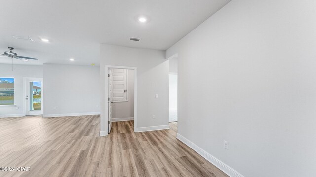 empty room featuring light hardwood / wood-style flooring and ceiling fan