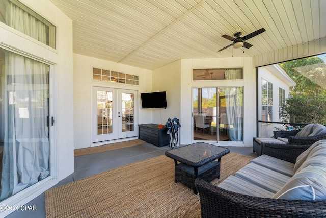 exterior space with french doors, ceiling fan, and a wealth of natural light