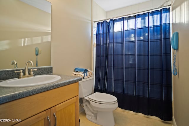 full bathroom with tile patterned flooring, vanity, shower / bath combination with curtain, and toilet