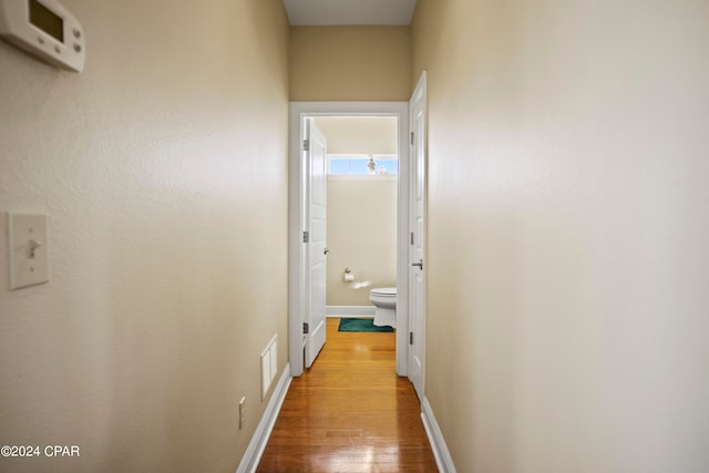 hall featuring hardwood / wood-style flooring