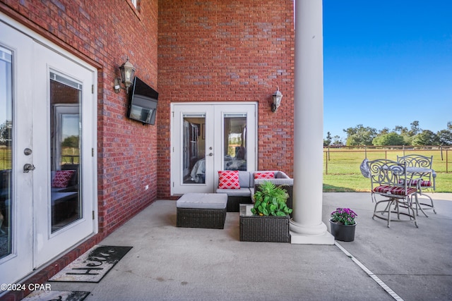 view of patio with an outdoor hangout area and french doors