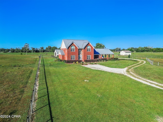 exterior space with a rural view