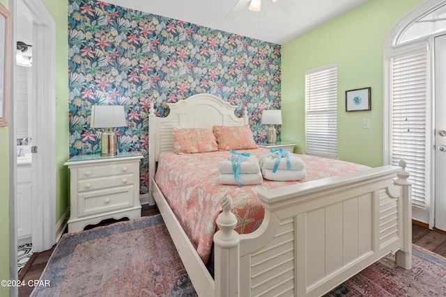 bedroom with dark wood-type flooring and ceiling fan