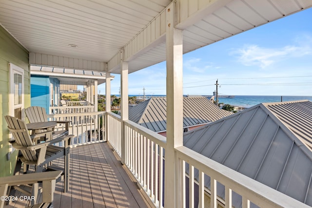 deck featuring a water view