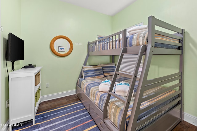 bedroom featuring dark wood-type flooring