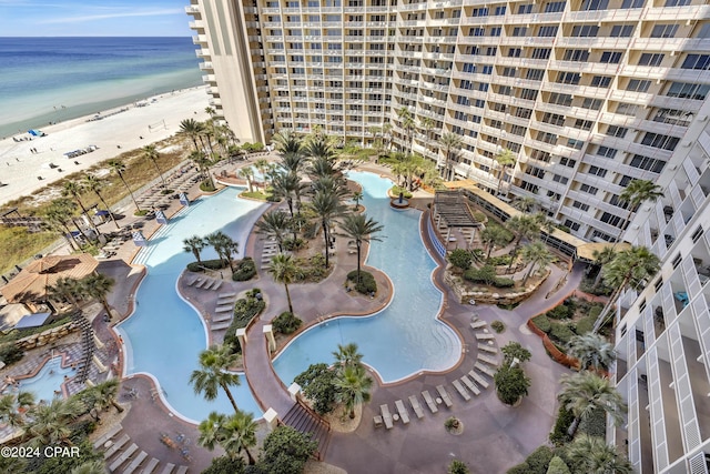 aerial view featuring a water view and a beach view