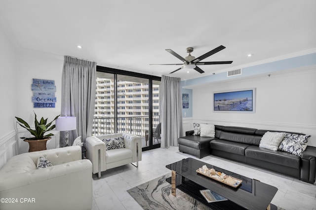 living room featuring a wall of windows, ornamental molding, and ceiling fan