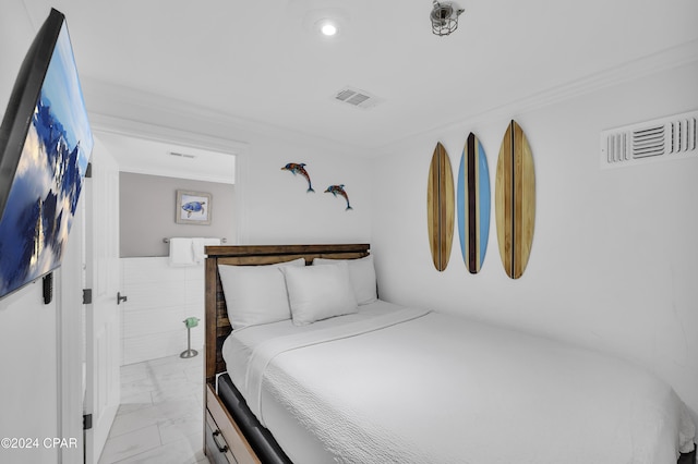 bedroom featuring ornamental molding