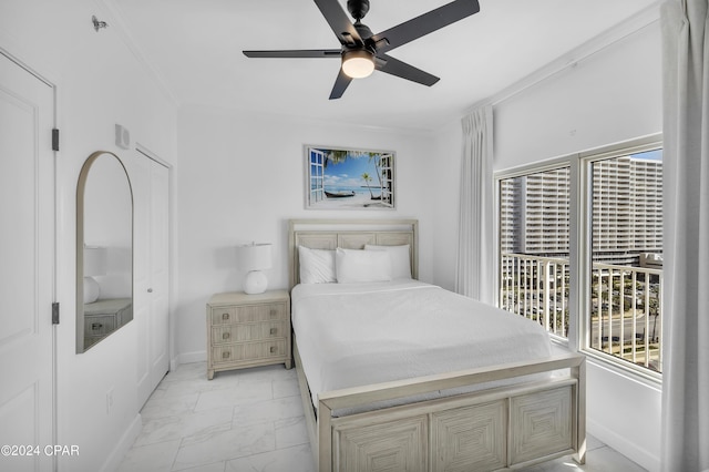 bedroom with multiple windows, ornamental molding, and ceiling fan