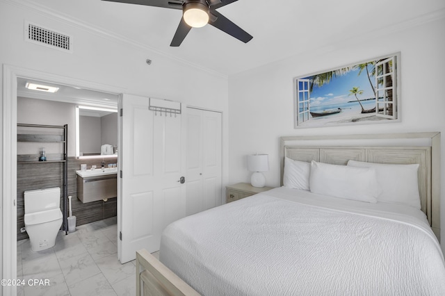 bedroom with sink, ceiling fan, and a closet