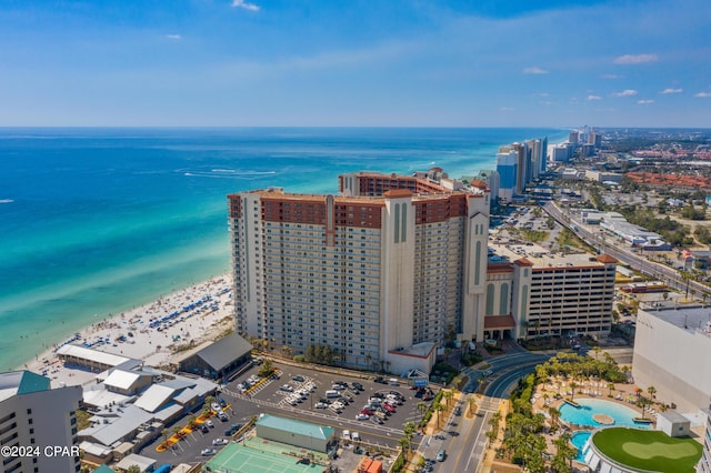 bird's eye view featuring a water view and a view of the beach