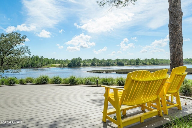 wooden deck with a water view