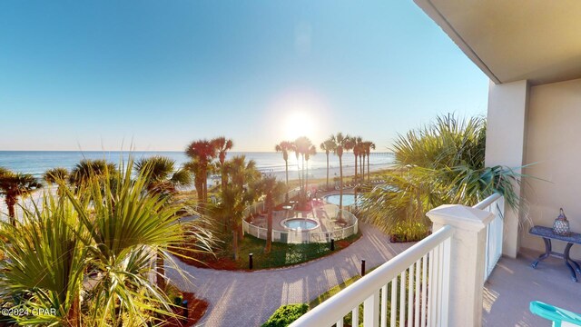 balcony featuring a water view