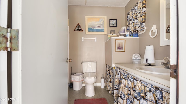 bathroom with sink and toilet