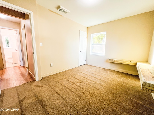 spare room with carpet