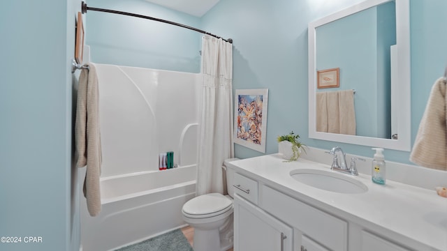 full bathroom with tile patterned floors, vanity, shower / bathtub combination with curtain, and toilet