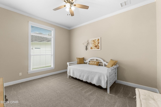 bedroom featuring carpet floors, visible vents, ornamental molding, and baseboards