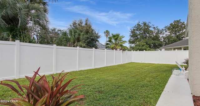 view of yard featuring a fenced backyard