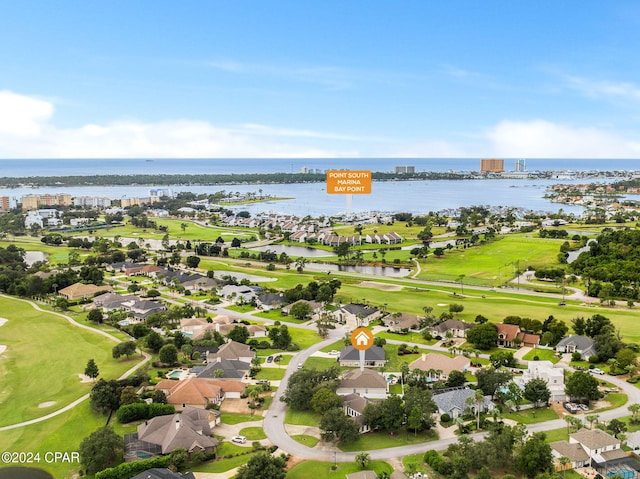 drone / aerial view with a residential view and a water view