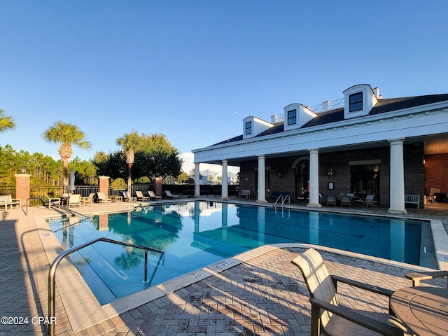 view of pool featuring a patio