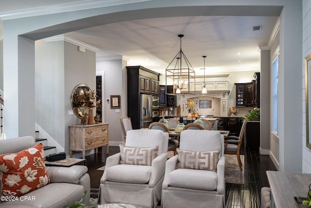 living room with ornamental molding and dark hardwood / wood-style flooring