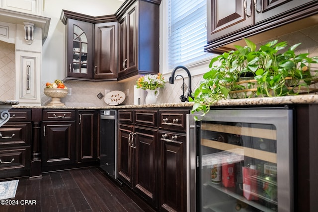 kitchen with decorative backsplash, wine cooler, dark brown cabinetry, and dark hardwood / wood-style flooring