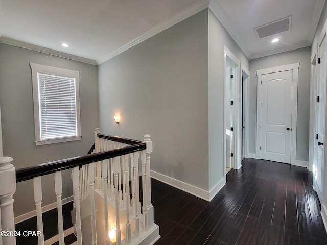 corridor with crown molding and dark hardwood / wood-style floors