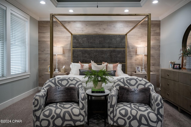 carpeted bedroom featuring crown molding and wooden walls