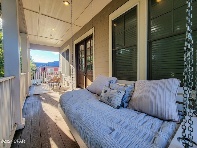 wooden terrace with covered porch