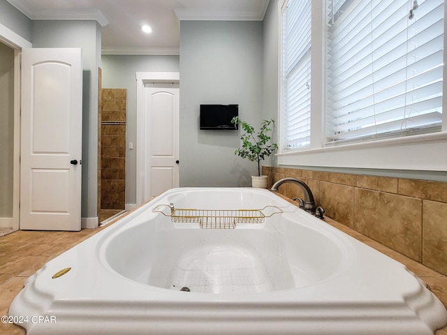 bathroom featuring tile patterned flooring, ornamental molding, and shower with separate bathtub