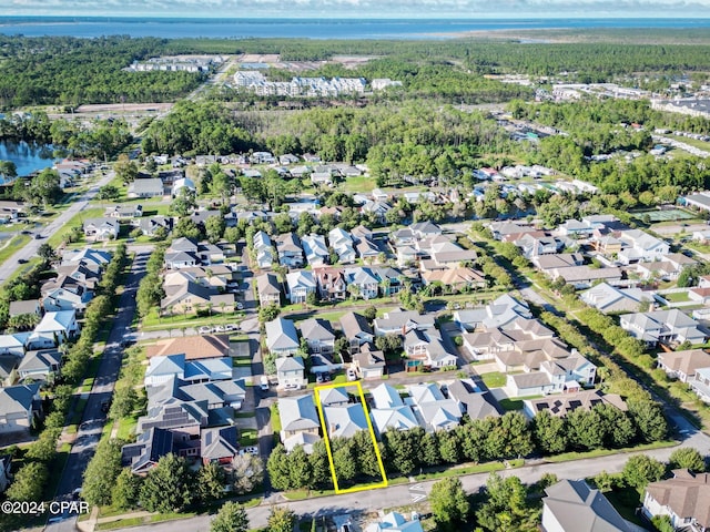 drone / aerial view with a water view