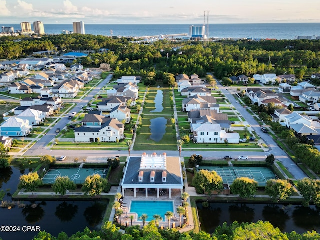 birds eye view of property featuring a water view