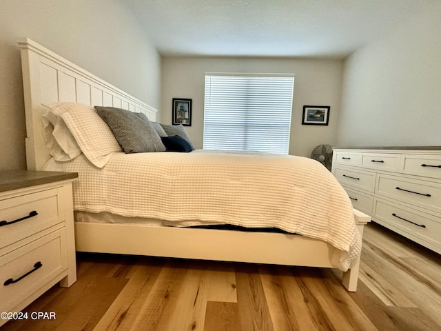 bedroom featuring light hardwood / wood-style floors