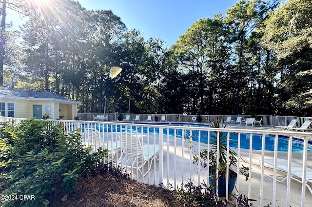 view of swimming pool featuring a patio