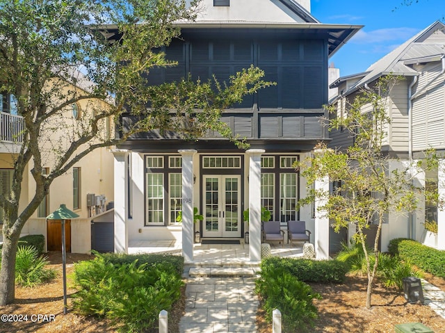 exterior space featuring a patio and french doors