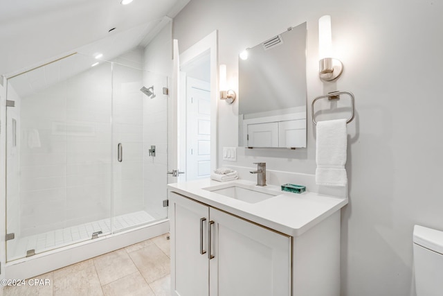198 E Water St, Inlet Beach, FL 32461 - bathroom featuring vanity, a stall shower, tile patterned floors, and lofted ceiling