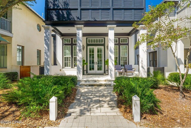 198 E Water St, Inlet Beach, FL 32461 - property entrance featuring covered porch, stucco siding, and french doors