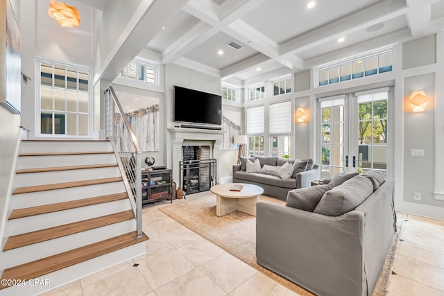 198 E Water St, Inlet Beach, FL 32461 - living room with a towering ceiling, stairs, beam ceiling, coffered ceiling, and a fireplace