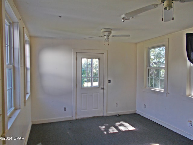 7949 Old Spanish Trl, Sneads, FL 32460 - entrance foyer featuring carpet, baseboards, and ceiling fan
