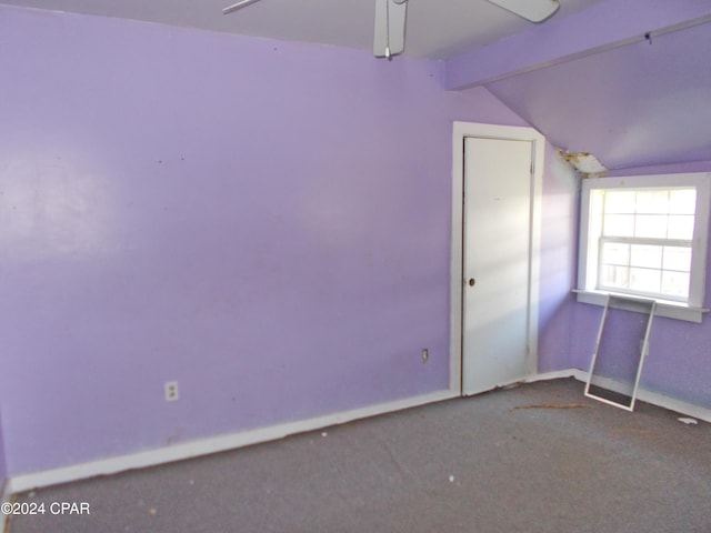7949 Old Spanish Trl, Sneads, FL 32460 - carpeted spare room with lofted ceiling with beams and baseboards