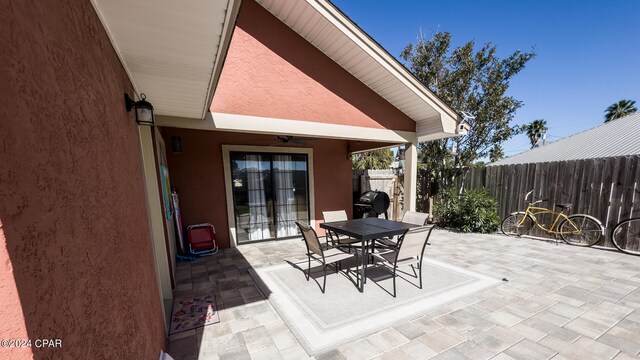 view of patio / terrace with ceiling fan